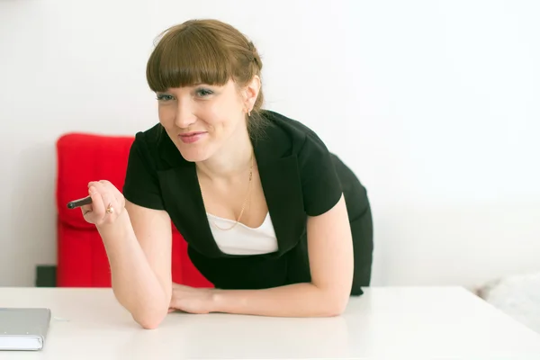 A girl in the office — Stock Photo, Image