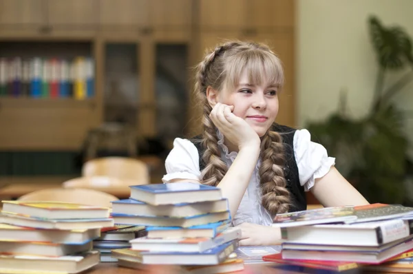 Schoolgirl with textbooks — Stock Photo, Image