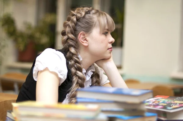 Schoolgirl with textbooks — Stock Photo, Image