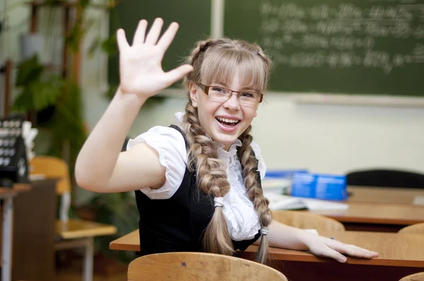 Schoolgirl on board background — Stock Photo, Image