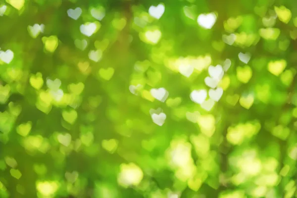 Valentine abstrakte grüne Hintergrund mit Herz Bokeh. — Stockfoto