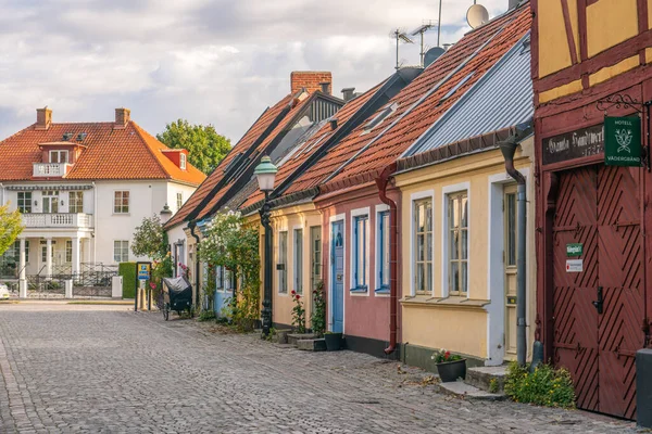 Ystad, Sweden - 6 Sep, 2022: Houses from older times with a cobblestone street