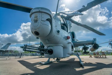 Singapore, 15 Feb, 2020: Low angle view of the Marines and Military Transport Helicopter, with a three barrel gun.