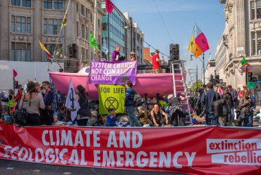 London, UK, 19th April 2019. Climate change/eco protesters at the Extinction Rebellion demonstration, at Oxford Circus, London, in protest of world climate breakdown and ecological collapse.