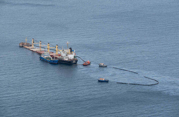 Catalan Bay, Gibraltar. 5th Sept 2022. The OS 35 bulk carrier which collided with the Adam LNG tanker off Gibraltar, lies beached near Catalan Bay, as crews clean and prevent the spread of escaped oil.