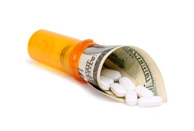 Bottle of pills and money isolater on white clipart