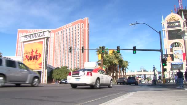 LAS VEGAS, NEVADA - CIRCA 2012 - Las Vegas Boulevard Strip and the Venetian Hotel and Casino with walking by on sunny day. — Stock Video