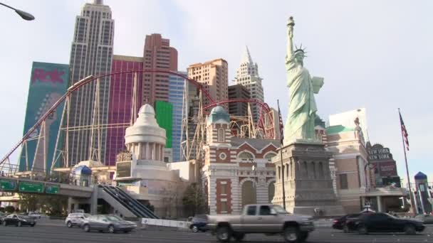 LAS VEGAS, NEVADA - CIRCA 2012: Las Vegas Boulevard Strip with many walking by on sunny day. — Stock Video