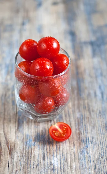 Cherry tomatoes in a glass — Stock Photo, Image