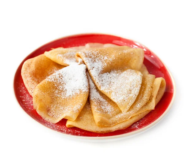 Pancakes on red plate — Stock Photo, Image