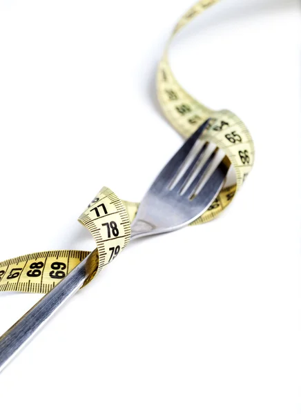 Fork and measure tape — Stock Photo, Image