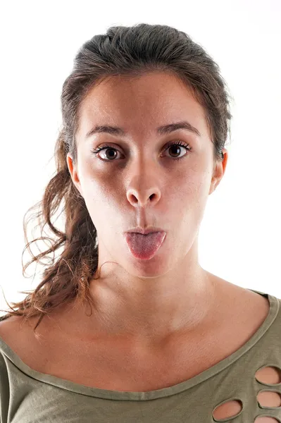 Woman close up portrait against white background. Tongue out. — Stock Photo, Image