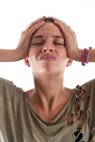 Vrouw close-up portret tegen witte achtergrond. wanhopig expr — Stockfoto