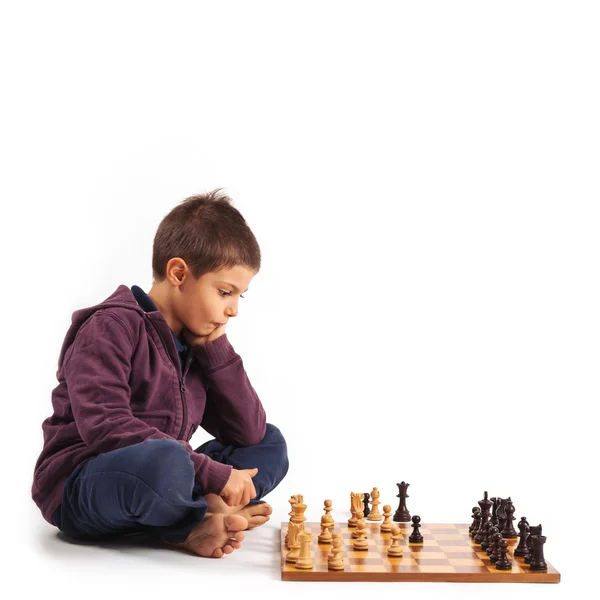 Child playing chess — Stock Photo, Image