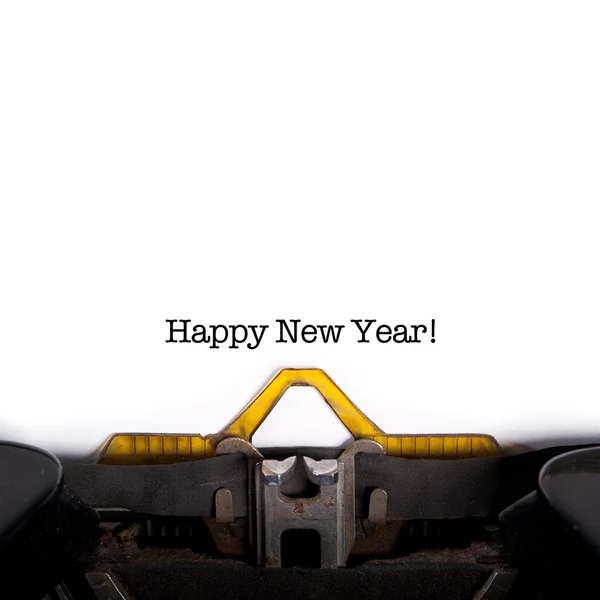 "Frohes neues Jahr! " Nachricht auf alter Schreibmaschine getippt. — Stockfoto
