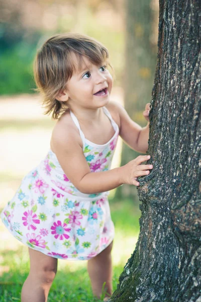 One year little girl playing in the park portrait. — Stock Photo, Image