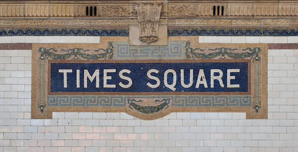 Times Square - New York city subway sign tile pattern in midtown Manhattan