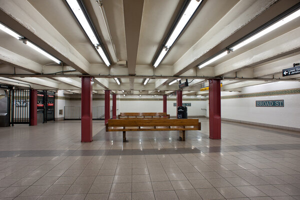 Empty interior view of Broad St. subway station in New York City