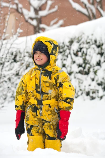 Portrait of young kid in the snow — Stock Photo, Image