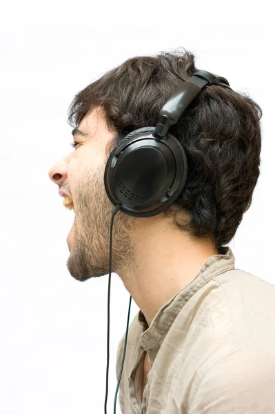 Perfil de um homem com fones de ouvido — Fotografia de Stock