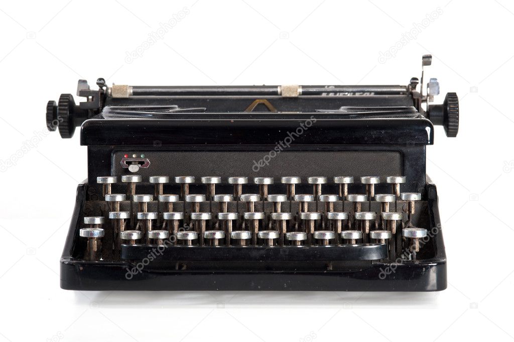 Vintage black typewriter isolated on white background