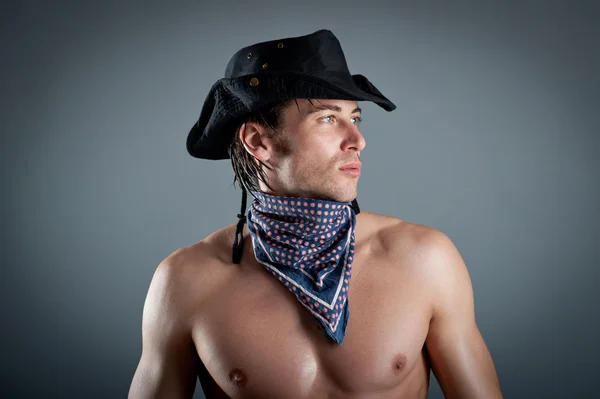 Portrait of confident young man shirtless against grey background — Stock Photo, Image