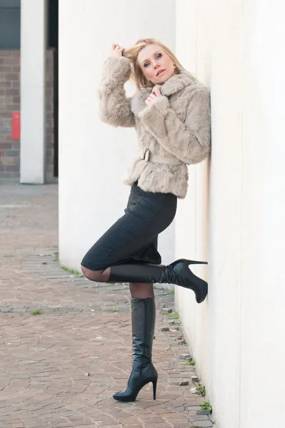 Portrait of young attractive woman with fur — Stock Photo, Image