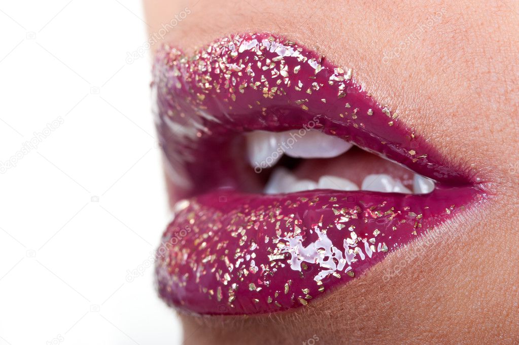 Close up of glossy red bright lips