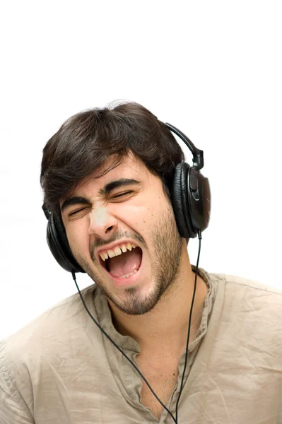 Portret van een man met oor-telefoons — Stockfoto