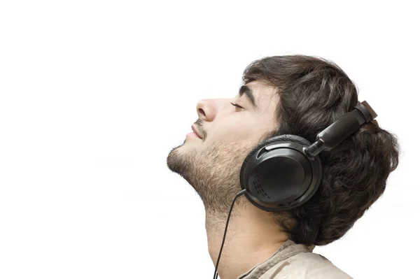 Perfil de un hombre con auriculares aislados en blanco — Foto de Stock