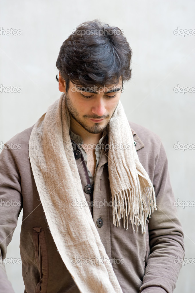 Portrait of casual man wearing scarf