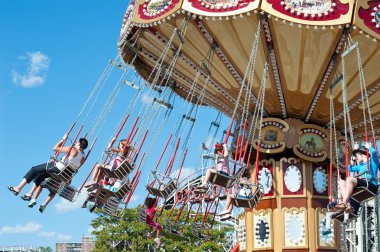 NEW YORK - JUNE 27: Coney Islands fairground attraction clipart