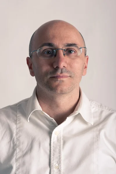 Bald man with glasses portrait. White background — Stock Photo, Image