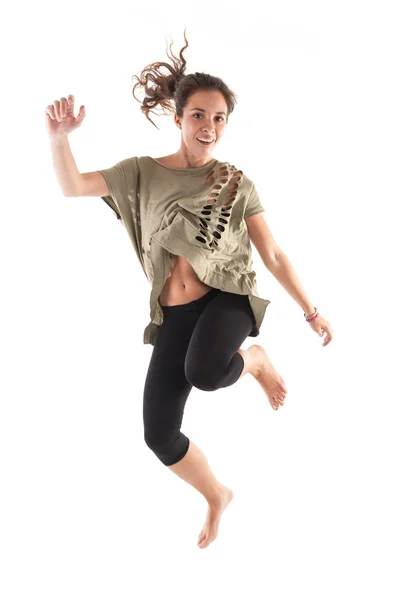 Mooie brunette meisje springen over witte achtergrond. studio opname — Stockfoto