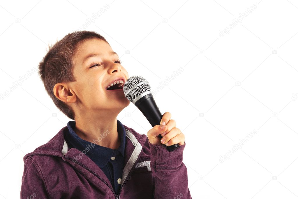 Child singing with microphone, isolated on white background