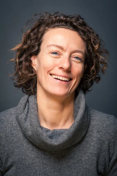 Smiling middle aged woman close up portrait — Stock Photo, Image