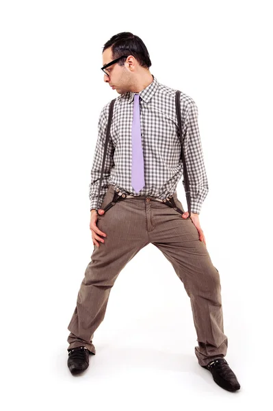 Divertido retrato de nerd joven con gafas aisladas sobre fondo blanco. Cuerpo completo . —  Fotos de Stock