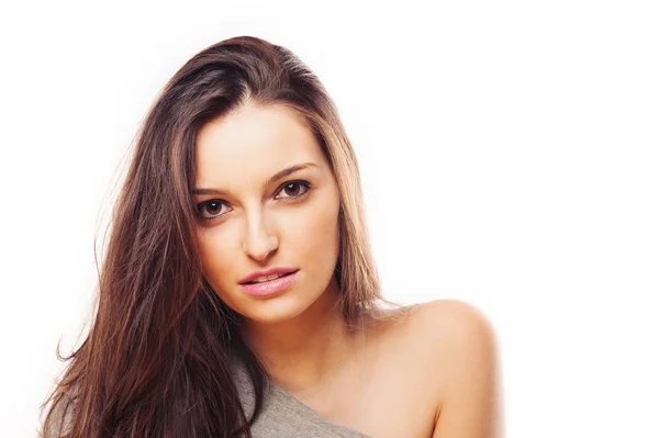 Beautiful brunette woman intense close up portrait on white background. — Stock Photo, Image