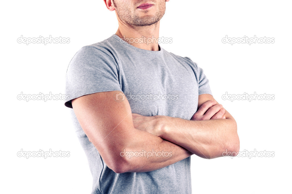 Crossed arms close up of muscular man on white background.