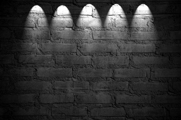 Spotlight on the brick wall — Stock Photo, Image