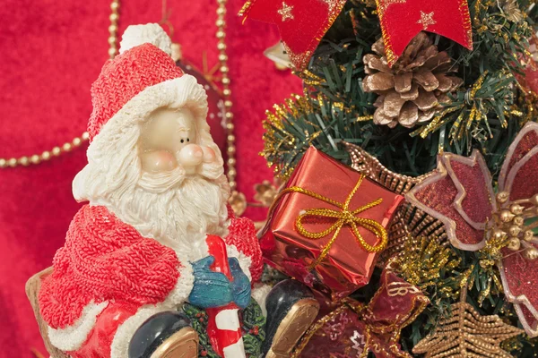 Santa claus en gift van Kerstmis — Stockfoto