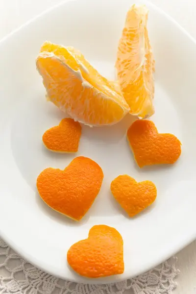 Orange heart from orange peels — Stock Photo, Image