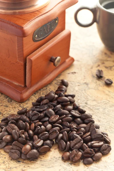 Coffee cup with coffee grinder Stock Photo