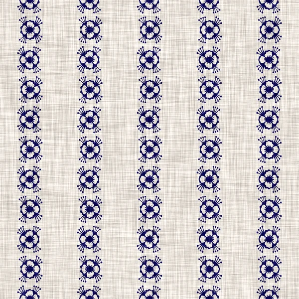 Indigo blue flower block print dyed linen texture background. Seamless woven japanese repeat batik pattern swatch. Floral organic distressed blur block print all over textile.