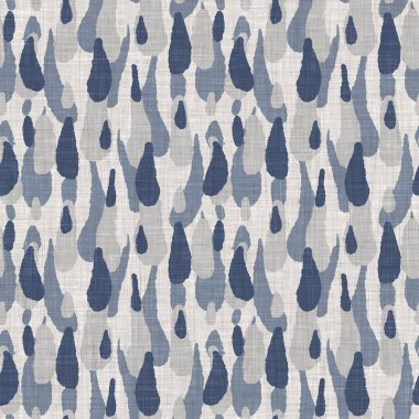 Fransız mavisi karalama motifli keten desenli. Tonal kır evi tarzı soyut karalama motifi arka planı. Basit bir kırsal kumaş tekstil etkisi. İlkel, pejmürde, şık bir kumaş..