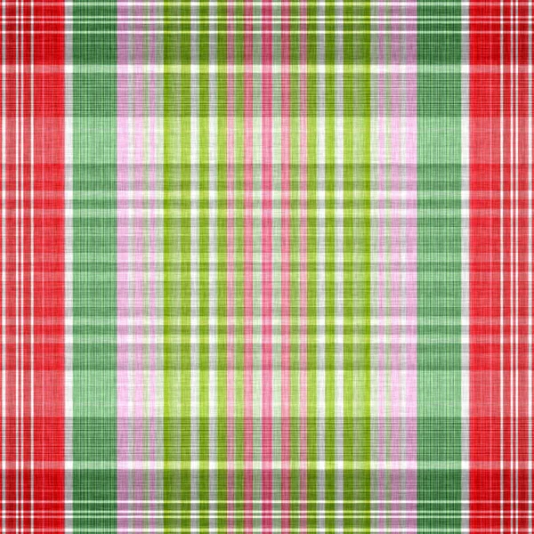 Christmas knit wool tartan background pattern. Traditional Scottish plaid for seasonal holiday texture effect. Seamless winter red and green melange all over print