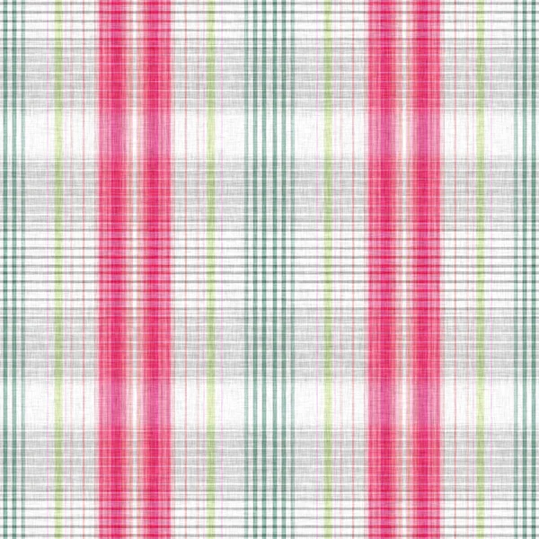 Christmas knit wool tartan background pattern. Traditional Scottish plaid for seasonal holiday texture effect. Seamless winter red and green melange all over print