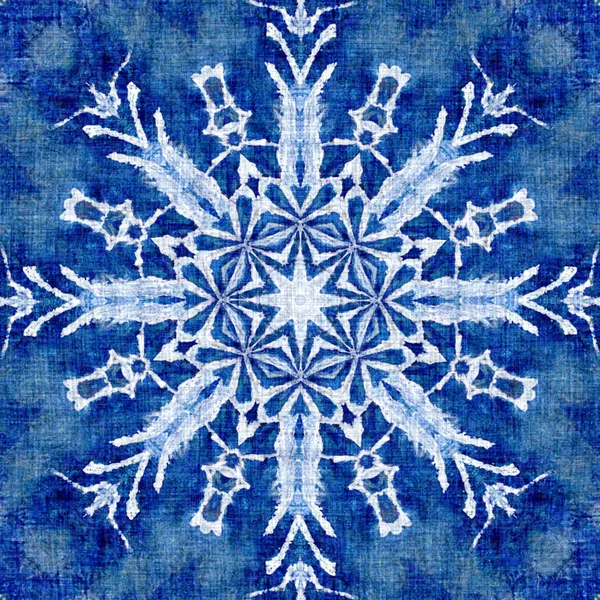 Indigo blue snow flake pattern background. Frosty batik painterly effect seamless backdrop. Festive cold holiday season wall paper tile