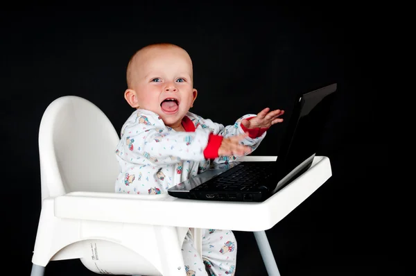 Baby with the laptop — Stock Photo, Image