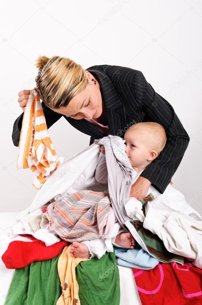 Mother and her son doing laundry